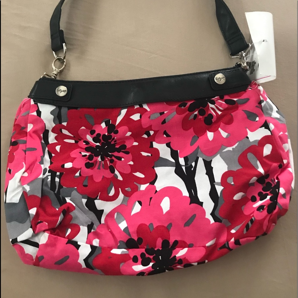 Thirty one interchangeable skirt. The handle is peeling but the skirt is fine.